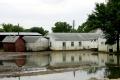 Oakville, Iowa, June 27, 2008 -- Building displacements and pile-ups are among the many tragedies in Oakville when the Iowa River breeched its lev...