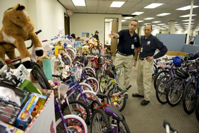 Houston, TX, December 17, 2008 -- Piles of toys at a FEMA Area Field Office (AFO) await pickup by the United States Marine Corps.  The toys are he...