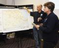 Galveston, TX, November 13, 2008 -- FEMA FCO Sandy Coachman looks at a map detailing potential FEMA housing sites with Branch Director Gerry Stole...