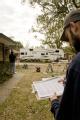 Bridge City, TX, November 5,2008 -- Ben Juday, a member of the FEMA housing strike force, checks for the address of a home in Bridge City, TX.  FE...