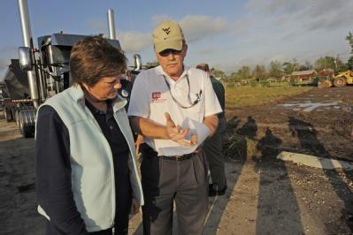 Bridge City, TX, November 12, 2008 -- FEMA FCO, Sandy Coachman looks at a housing site plan for mobile homes with Carl Miller, the Army Corps of E...