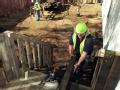 Delzura, CA, December 5, 2007 -- Alan Fryar, of Babcock Services, Inc., works to build a stairway for the FEMA-provided mobile home that the a fam...