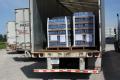 Rock Island, IL, June 19, 2008 -- Pallets of bottled water are loaded in trailer trucks at the Rock Island Army Arsenal and ready for delivery as ...