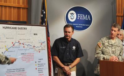 Washington, DC, September 2, 2008 -- FEMA Administrator Paulison listens to the Major General Don T. Riley, US Army Corps of Engineers present the...