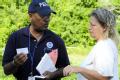Jeffersonville, GA, May 27, 2008 -- Community Relations (CR) specialist Ernest Stallworth speaks with a homeowner in the disaster area. FEMA CR te...
