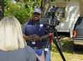 Jeffersonville, GA, May 27,2008 -- Community Relations (CR) specialist Julius Gibbons giving an interview to the local media. FEMA CR teams use ma...