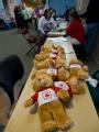 Windsor, CO, May 26, 2008 -- State Farm 'teddy bears' lined up on a table at the Recovery Center in Colorado.  The Community  Rec center was trans...