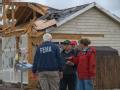 Windsor, Colorado, May 26, 2008 -- Fred Turner with FEMA's Community Relations team talks with residents affected by the storm. Photo: Michael Rie...