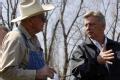 Des Arc, AR, March 25, 2008 -- TW Vincent, Secretary of the Levee Board, right, briefs Arkansas Governor Mike Beebe, left, along with other electe...