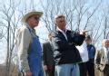 Des Arc, AR, March 25, 2008 --TW Vincent, Secretary of the Levee Board, right, briefs Arkansas Governor Mike Beebe, left, along with other elected...