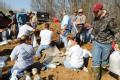 Des Arc, AR, March 25, 2008 -- Members of the community fill sandbags for an operation going on near a levee in an area called Sandhill.

Jocely...
