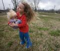 Cape Girardeau, MO, March 27, 2008 -- Four year old, Alison Schaefer and her doll, Delana, stand in a park near their home in Cape Girardeau.    
...