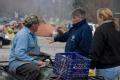 Dutchtown, MO, March 29, 2008 --- FEMA Representative, Jack Heesch talks to flood victims, Doyle and Julie Parmer following the Mississippi river ...