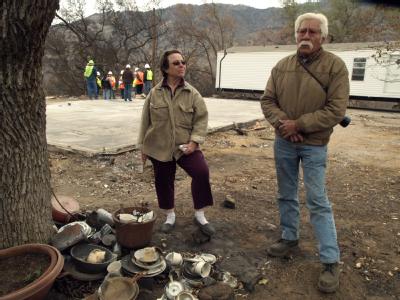 Pauma Valley, CA, November 28, 2007 --  Vonda and Benjamin Rodriguez, of the La Jolla Tribe, stand beside what is left of the belongings from thei...