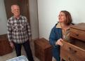 Delzura, CA, December 8, 2007-- Leighann Grice tells her husband how excited she is about the wooden chest of drawers that comes with the mobile h...