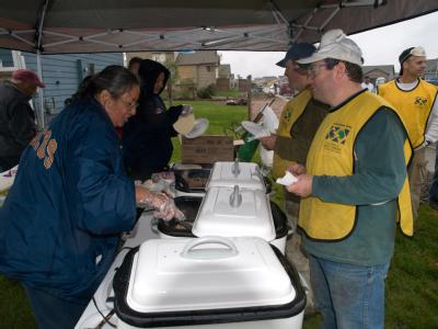 Windsor, Colorado, May 26, 2008 -- Gloria Rodriguez, a Windsor resident served up hot fresh burritos for volunteers. Photo: Michael Rieger/FEMA