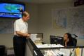 Washington, DC, September 14, 2008 -- FEMA Deputy Administrator Harvey Johnson speaks with an employee  in the National Response and Coordination ...