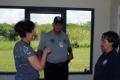 Moore Haven, FL, September 15, 2008 -- FEMA Security Manager Barbara Taylor speaks with Magda Reyes FEMA Disaster Recovery Center(DRC) Manager and...
