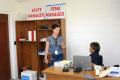 Moore Haven, FL, September 15, 2008 -- FEMA Security Manager Barbara Taylor speaks with Magda Reyes FEMA Disaster Recovery Center(DRC) Manager as ...