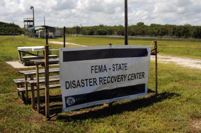 Moore Haven, FL, September 15, 2008 -- Signs are placed at the Glades County FEMA/State Disaster Recovery Center(DRC) to help residents affected b...