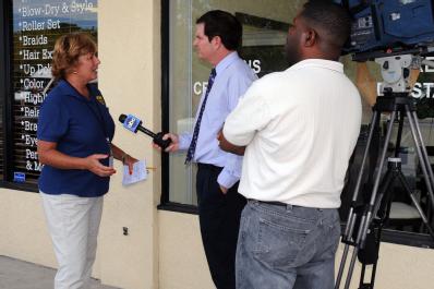 Ft. Pierce, FL, September 16, 2008 -- FEMA Public Information Officer(PIO) Renee Bafalis speaks with WPBF-TV (ABC) 25 reporter Jim Abath at a shop...