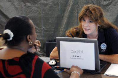 Ft. Pierce, FL, September 15, 2008 -- At the St.Lucie County FEMA/State Disaster Recovery Center(DRC), FEMA Individual Assistance(IA) Specialist E...