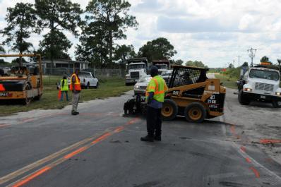 Immokalee, FL, September 13, 2008 -- This Collier County road is being repaired as result of apparent flooding from Tropical Storm Fay.  FEMA Publ...