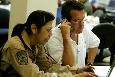 Baton Rouge, LA, August 31, 2008 -- Custom and Border Protection (CBP),Air Interdiction Agent, Sylvia Carrizoza (L) and Peter McNall, Director, Un...