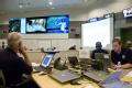 San Antonio, TX, August 29, 2008 -- FEMA specialists watch the weather report at the Alamo Command Center in San Antonio.  FEMA is working with St...