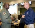 San Antonio, TX, August 29, 2008 -- Gerry Stoler, FEMA liaison for the Alamo Operations center talks with Col. M.L. Mullen, the Texas Air National...
