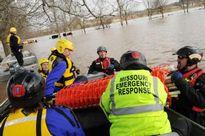 Eureka, MO, 03/22/2008 -- Members of the Missouri Emergency Response Service team, a non-profit that does large animal rescues, along with the Hum...