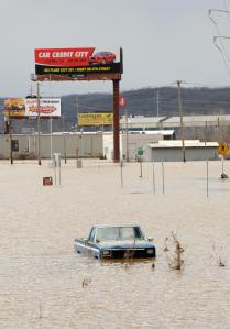 Valley Park, MO, 03/23/2008 -- This pickup truck is stranded by flood waters that continue covering streets in neighborhoods near the Meramec Rive...