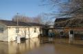 Dutchtown, MO, March 20, 2008 -- This small rural community was inundated with fast-moving flood waters that flooded homes and submerged the main ...