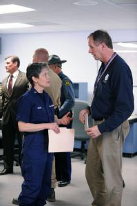 Eureka, MO, March 21, 2008 -- Region 7 Regional Administrator Richard Hainje, speaks to a member of the Coast Guard following a news conference  w...
