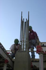 Arlington, VA, March 7, 2002 -- Construction workers continue work on top of the Pentagon. The reconstruction is a result of a terrorist attack on...