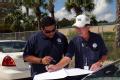 Immokalee, FL, September 13, 2008 -- FEMA Community Relations(CR) Specialist Vernon Andrews and FEMA Public Information Officer (PIO) William Lind...