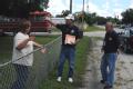 Immokalee, FL, September 13, 2008 -- FEMA  Community Relations(CR) Specialist Vernon Andrews and State Emergency Response Team (SERT) member are g...