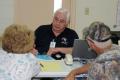 Callahan, FL, September 17, 2008 -- FEMA Individual Assistance(IA) Specialist Sterling Thompson speaks with Tropical Storm Fay affected potential ...