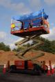 Jacksonville, FL, September 18, 2008 -- This power lift is being used as a portable tower to inspect percentage of capacity for each arriving and ...