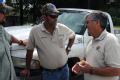 Callahan, FL, September 18, 2008 -- FEMA Debris Specialist Ray White speaks with Dale Burkett, Area Supervisor Nassau County Road and Bridge Depar...