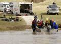 Eureka, MO, March 22, 2008 -- Members of the Missouri Emergency Response Service team, a non-profit that does large animal rescues,  prepare to go...