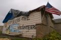 Windsor, Colorado, May 26, 2008 -- The message written on the side of this home is a result of volunteers who came to Windsor to help residents re...