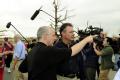 Picher, OK, May 13, 2008 -- Oklahoma Governor, C. Brad Henry, (L) points to an area of interest in a Picher neighborhood.   FEMA Administrator R. ...