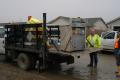 Fernley, NV, January 13, 2008 -- Workers load this flood damaged appliance on to a truck for disposal as a hazardous material. George Armstrong/FEMA