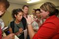 New Orleans, LA, August 31, 2008 -- Reporters ask questions to Governor Bobby Jindal's press secretary Melissa Sellers (on right in red)  at the E...