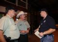 Lufkin, TX, September 2, 2008 -- Lance Carpenter, FEMA Situational Awareness liasion (r) talks with Gary Bennett(l) and Bill Davis, regional coord...
