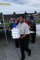 Houma, LA, September 7, 2008 -- Annette Flyod, General Manager,Piccadilly's Restaurant- Baton Rouge, hands out hot meals.  The chain,  like many o...