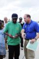 Houma, LA, September 7, 2008 --  Thomas Colgin (blue shirt), Small Business Association gives information to a small business owner.  Work was bei...