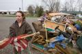 Dutchtown, MO, March 29, 2008 -- Flood victim, Kristin Golden helps her neighbor cleanup  following the Mississippi river flooding in Cape Girarde...