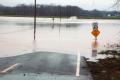 Pacific, MO, April 3, 2008 -- The road crossing the Meramac River south of the Bend Road bridge lies submerged under the flooded river. Franklin C...